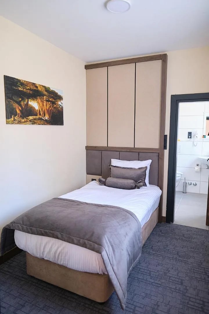 Dreibettzimmer (207) – separates Einzelbett